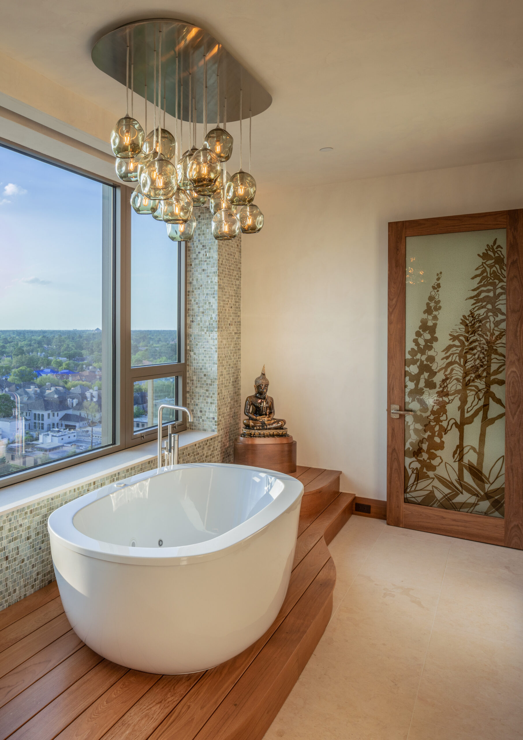 Freestanding oval tub overlooking city