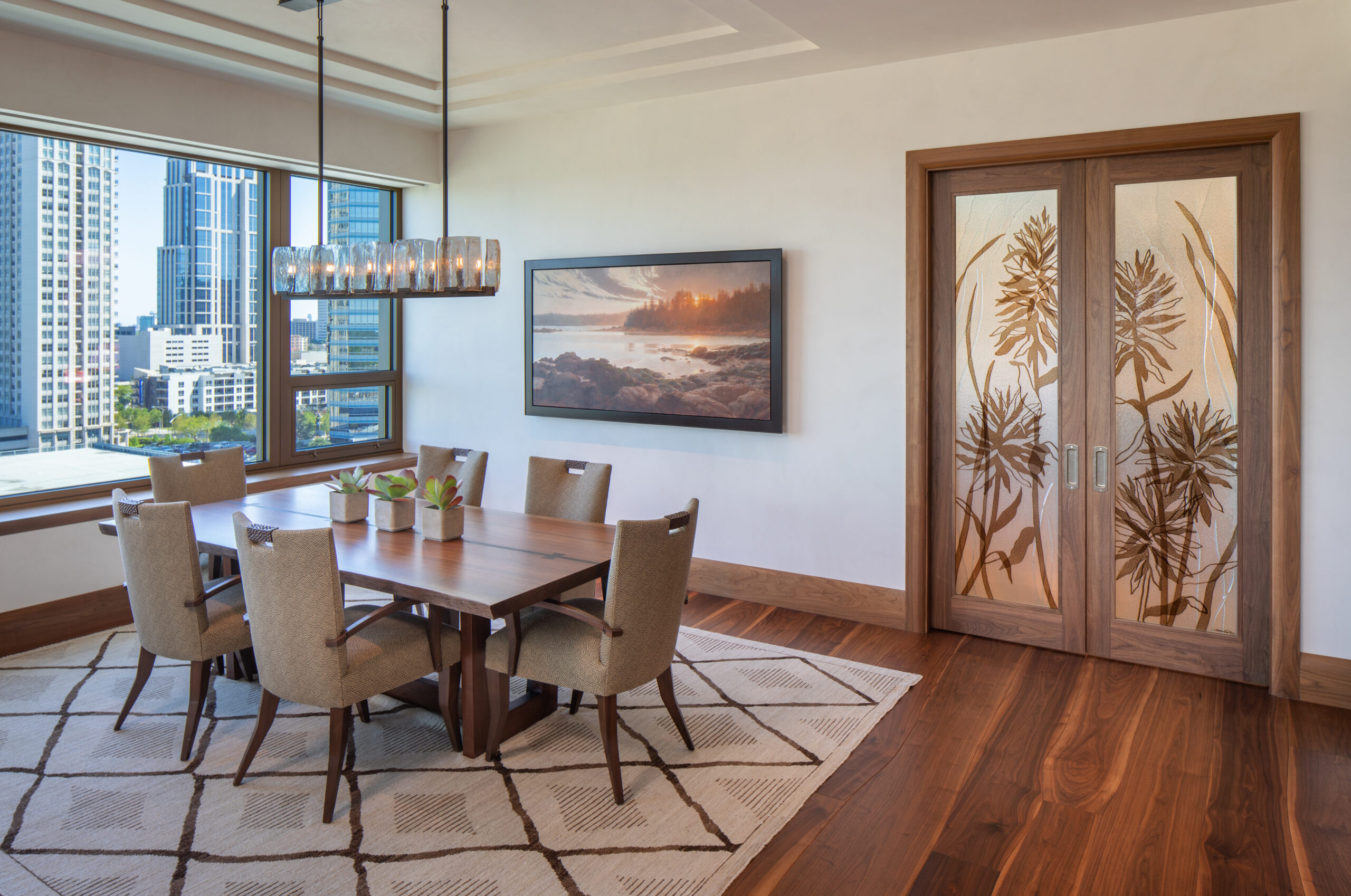 Dining room with city views through large window